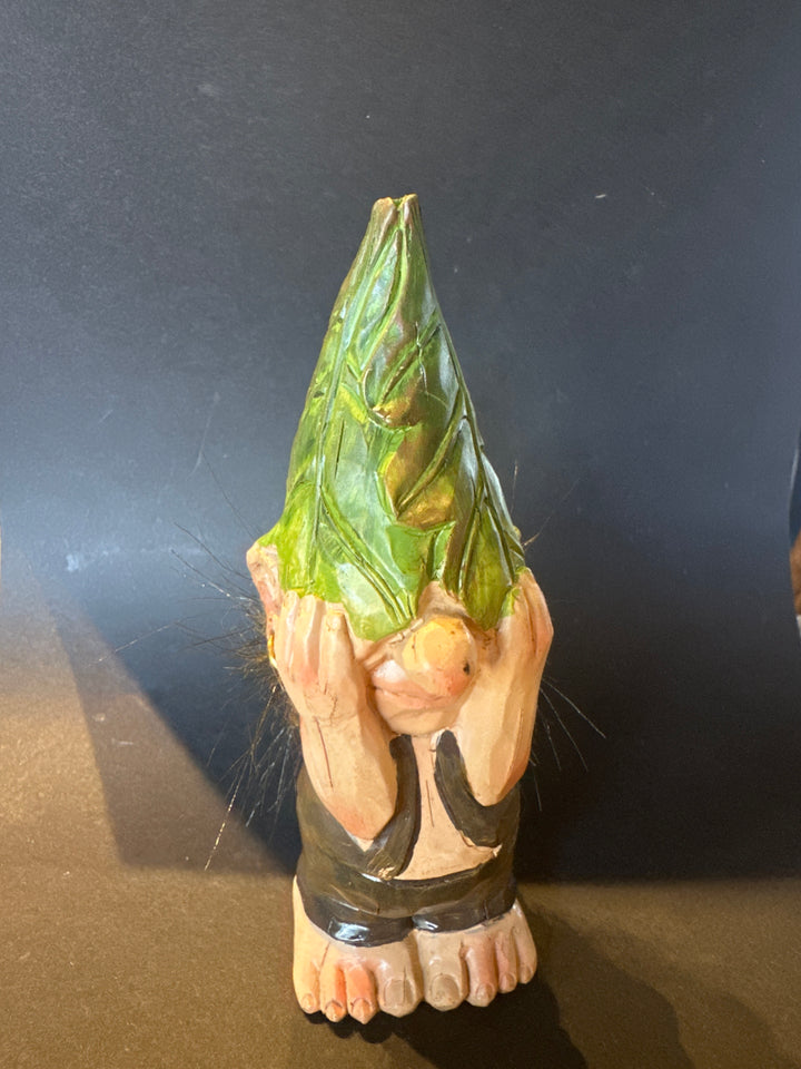 Elf with hands on his eyes