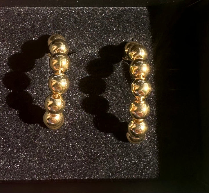 Sign earrings Rock gold