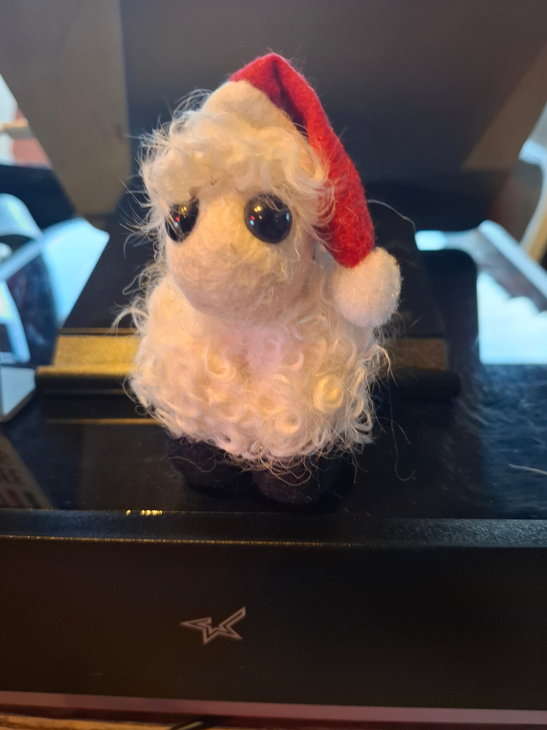 Curly lamb with cristmas hat